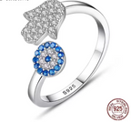 Anillo Protector "Doble Amuleto": Mano de Fátima y Ojo Turco en Plata de Ley 925. Diseño Ajustable con Cristales, Joyería con Intención y Estilo